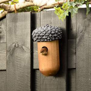 Wooden Acorn Bird House on Fence