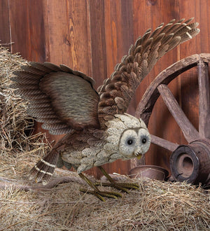 Metal Barn Owl Statue with Wings Up by barn