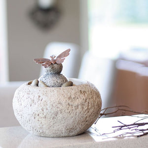 Stone Cairn Fountain with Butterfly indoors
